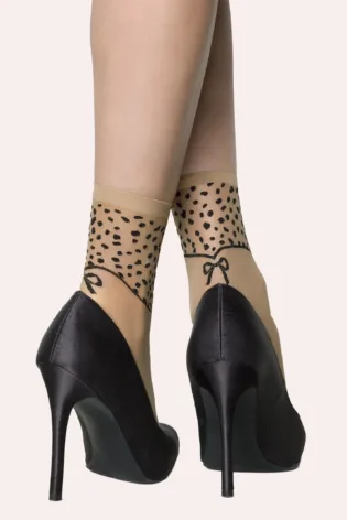 Skarpetki damskie w cętki z kokardką 20 den Coquette